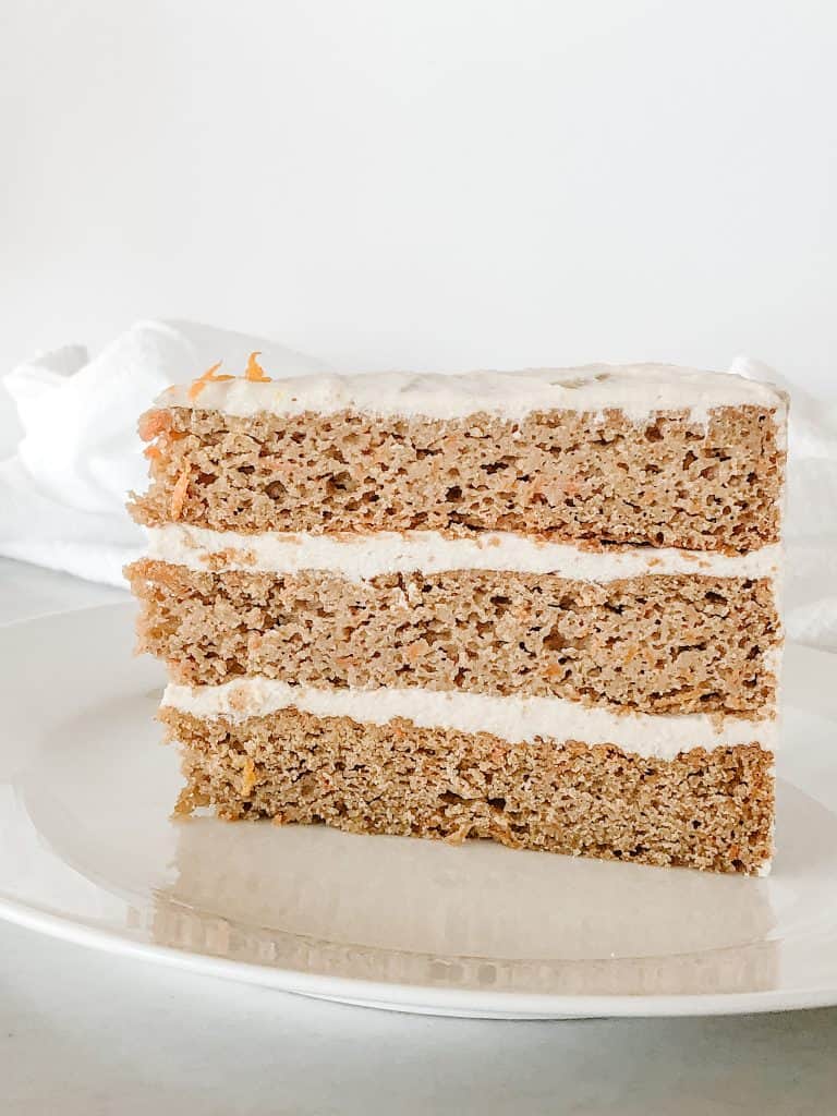 a side view of a slice of carrot cake